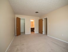 Empty main bedroom with direct access to the bathroom and other rooms